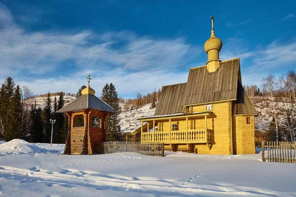 The church and belfry on a sunny winter day